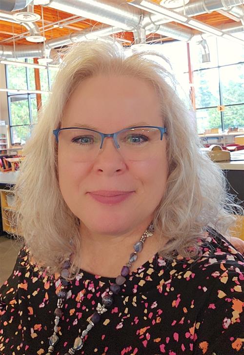 Ms. Qualey wearing glasses