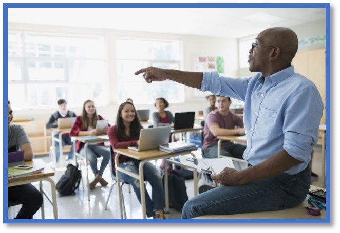 Teacher on desk