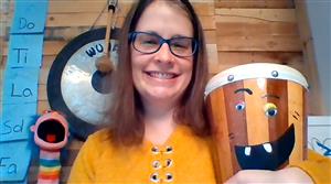 Teacher portrait holding a drum 