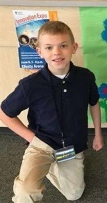 Male student wearing uniform 