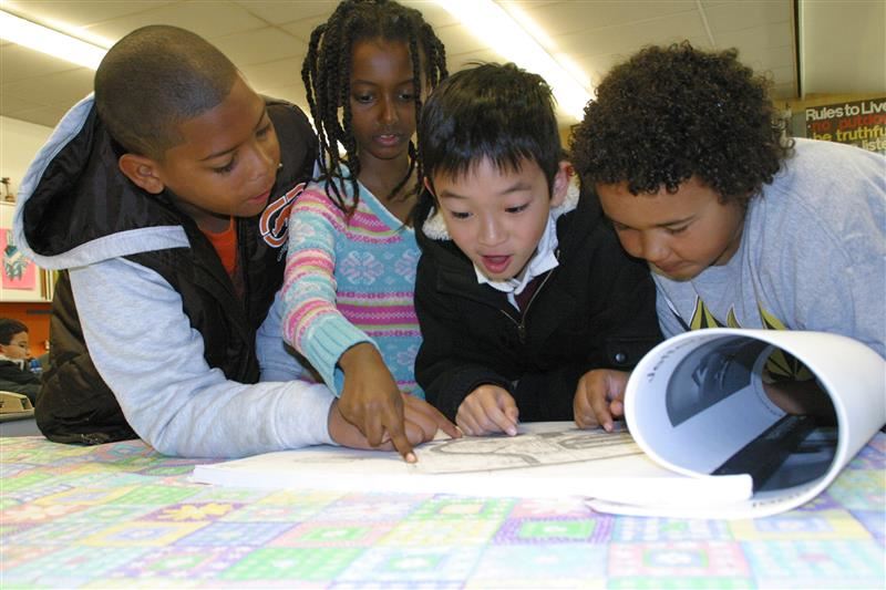 kids looking at a map kids looking at a map
